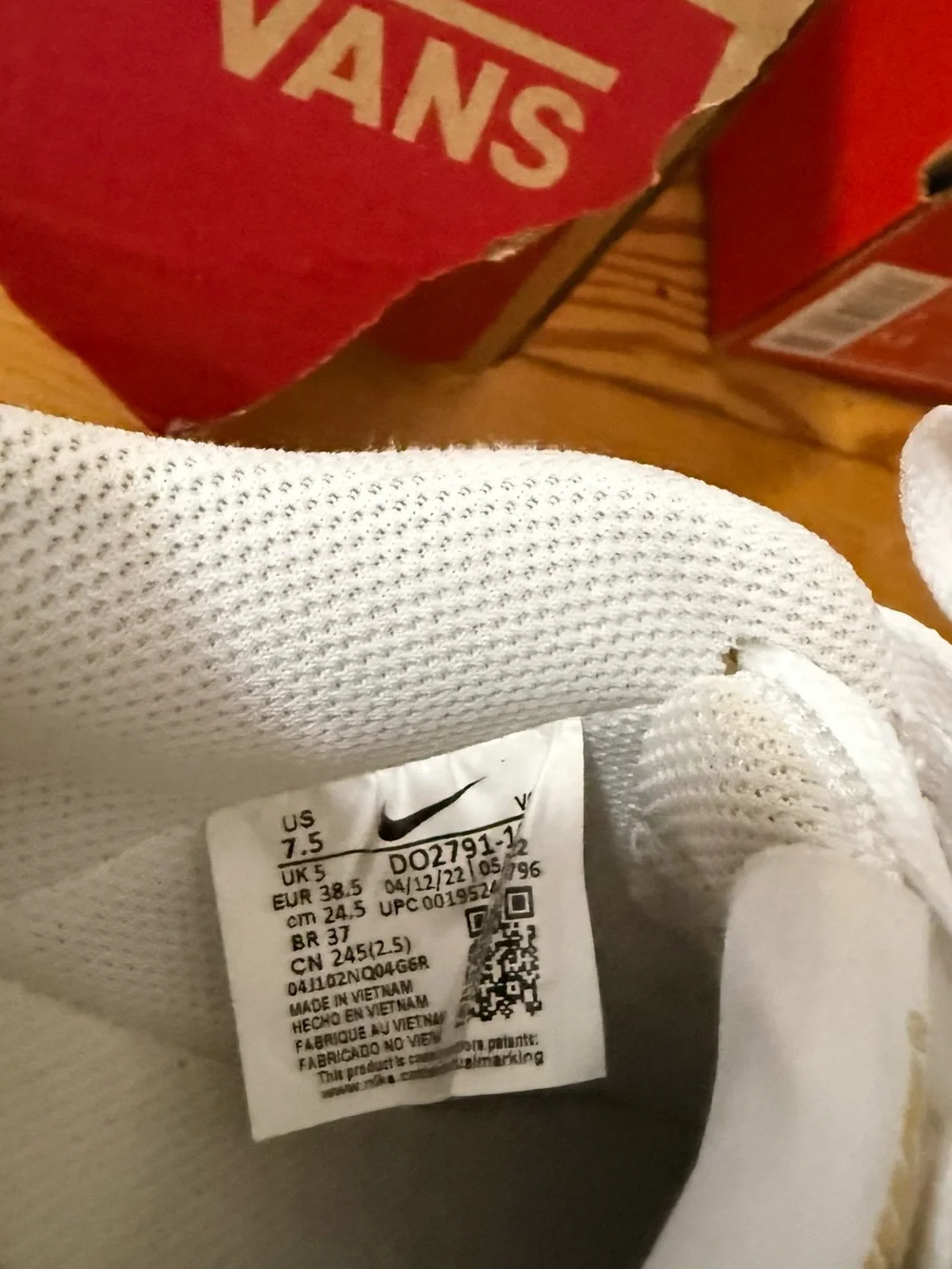 Nike Women’s White Sneakers with Leopard-Print Swoosh
